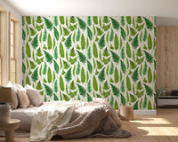 Fronds in mid green and deeper forest tones spread across the natural white wallpaper.