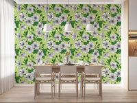 Dining area shows green leaves and hibiscus blooms in this Aloha wallpaper