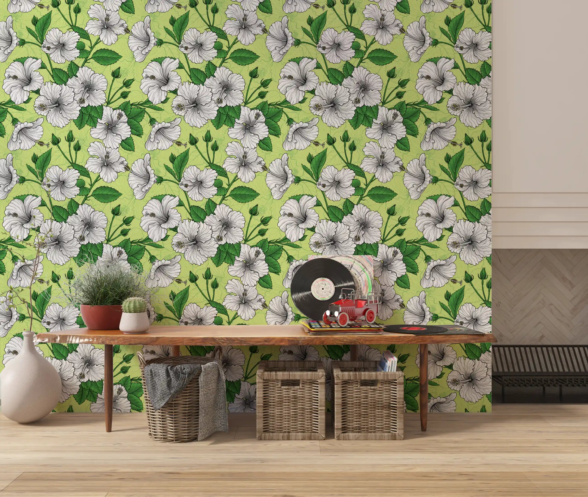 White hibiscus florals scatter across a pale lime base in this vintage Aloha wallpaper
