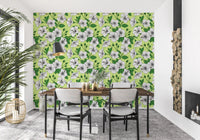 Tight pattern repeat of pale hibiscus heads and curling leaves on this aloha wallpaper.