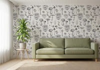 Ivory and ink shape the living room across this mushroom wallpaper.