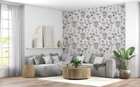 Quiet and grounded, the Lounge area  area pattern via the mushroom wallpaper.