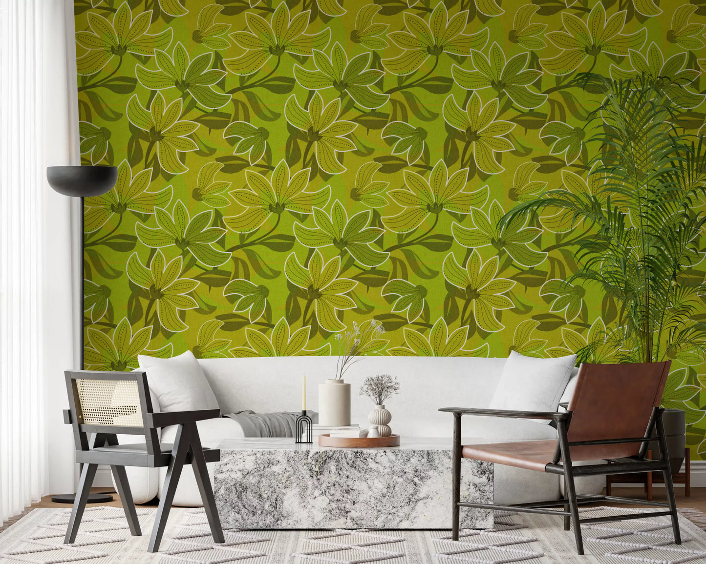 Lounge corner styled around the Green Bloom wallpaper near a cane sofa