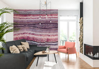 Banded mineral colour turns a Living area wall mural into the focal point.