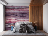 Set against a Bedroom, the Crimson & Amethyst Strata wall mural