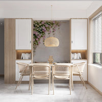 Heart-shaped green leaves drift across aged cream plaster in this floral wall mural