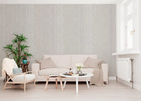 Linen Serenity wallpaper shows pale ivory threads stacked in a tight vertical rhythm