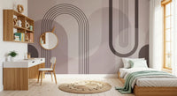Mauve arches and circles on the wall mural set the tone of a calm bedroom layout