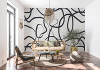 Continuous ink curves form the Serpentine Lines wall mural motif