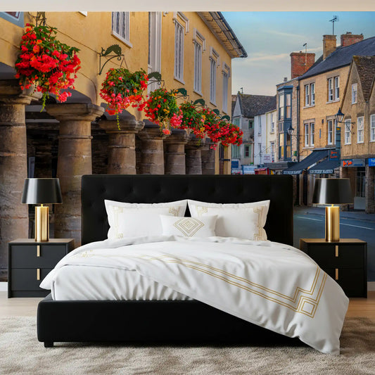 Village path wall mural with stone archway and colorful blooms
