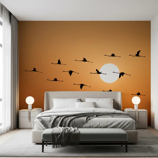 Flock of birds wall mural featuring warm golden sunset tones