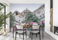 Cathedral view wall mural with lush flowers and greenery scene