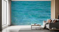 Tranquil water wall mural featuring soft aqua and blue tones