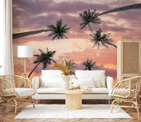 Palm silhouette wall mural against an orange sunset backdrop