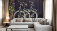Urban cycling wall mural with rustic architectural backdrops