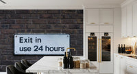Textured brick wall mural with worn exit sign appearance