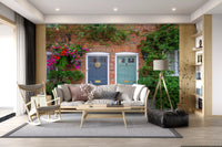 Flower lined street wall mural with inviting brick buildings