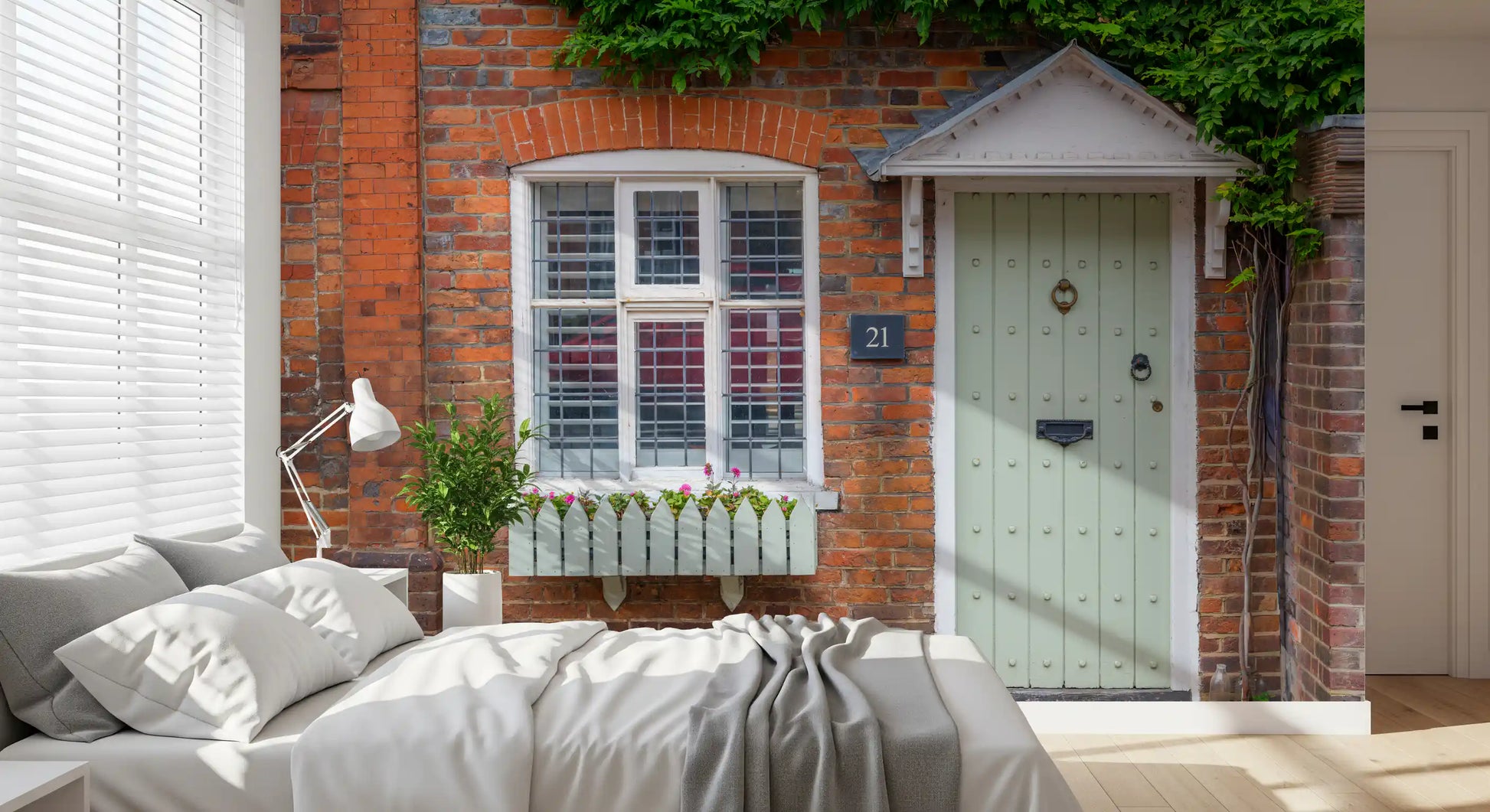 English countryside wall mural with cottage and floral garden
