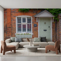 Stone cottage wall mural surrounded by vibrant garden blooms
