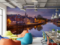 Dusk river wall mural with illuminated waterfront architecture