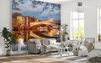 Evening riverside wall mural showcasing golden architectural glow