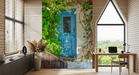 Coastal architecture wall mural with azure door and white facade