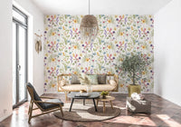 Meadow floral wallpaper with slim stems, green leaves, and airy white ground