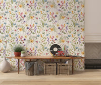 White floral wallpaper showing Wildflower Meadow blooms with leafy green trails