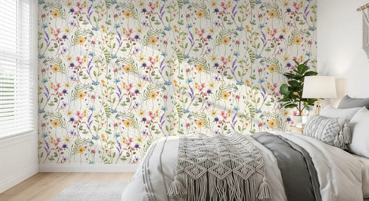 Bedroom Meadow Wallpaper with wildflower petals on a warm white base
