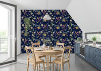Navy floral wallpaper with Enchanted Garden blooms and slender leaves