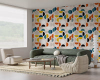 Orange and teal wallpaper with geometric rhythm, split rounds, and clean repeat