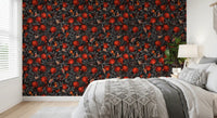 Crimson fruit and inky foliage frame the bedroom through this pomegranate wallpaper.