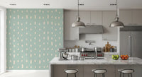Pale sage and cream tones extend along the Mid Century Seed Dots wall mural