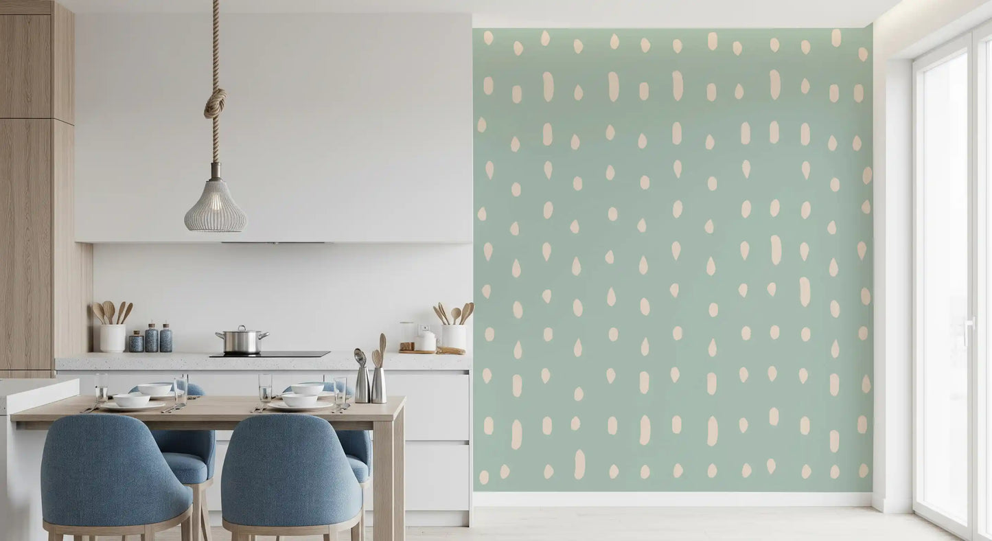 Kitchen and dining area setting where a sage Seed Dots wall mural fills the back