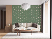 Warm cream against muted sage gives the Mid Century Seed Dots wall mural a quiet pulse.