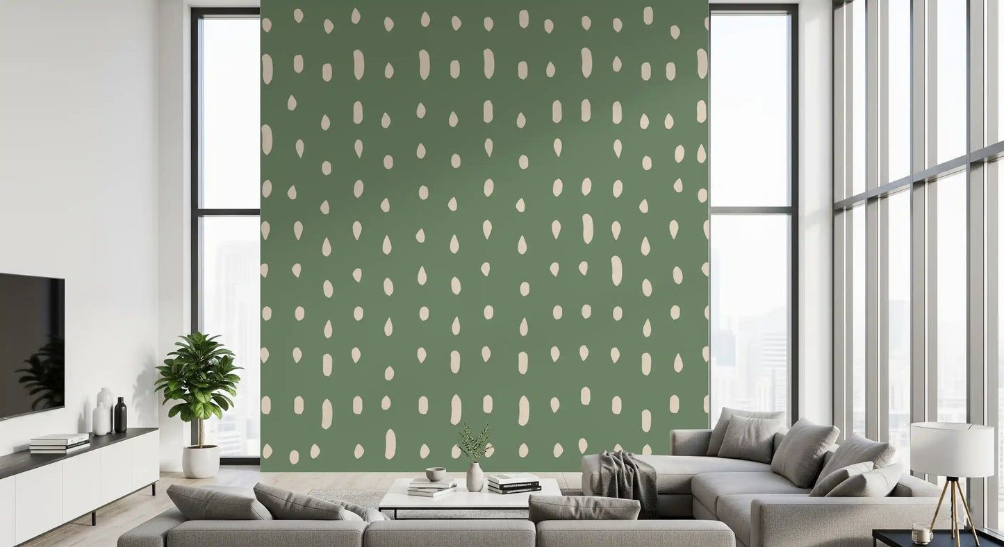 Pale drops over sage green calm a hallway scene in the Mid Century Seed Dots wall mural.
