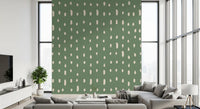 Pale drops over sage green calm a hallway scene in the Mid Century Seed Dots wall mural.