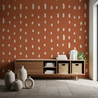 The Mid Century wall mural reads as scattered seed shapes on a rust ground.