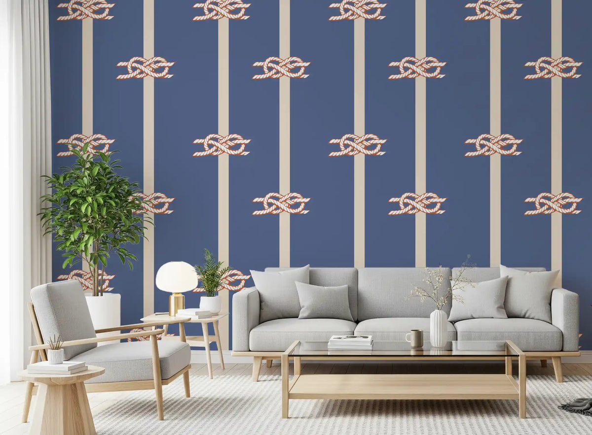 Nautical Rope Stripe wallpaper paces a Living area in cream, rust, and dusty blue.