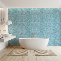 Cool aqua and teal watercolor leaves stitched into the Aqua Knit Cascade Wallpaper