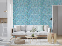 Painted strokes layered into vertical braids on the Aqua Knit Cascade Wallpaper