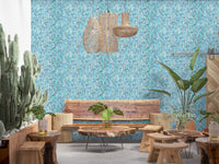 Tiny stitched leaves climbing in cool aqua and teal across this knit cascade wallpaper