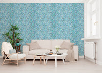 Vertical knit columns fill a calm living room finished with the cool aqua wallpaper