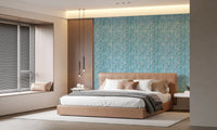 Watercolor leaf columns drifting down a restful bedroom in this Aqua Knit wallpaper