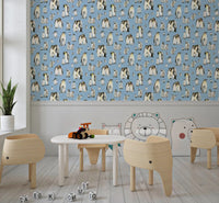 Painted in loose watercolour, emperors and chicks fill this Penguin Family wallpaper.