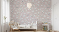 Bears Dreams wallpaper places adult animals and cubs over a blush pink ground.
