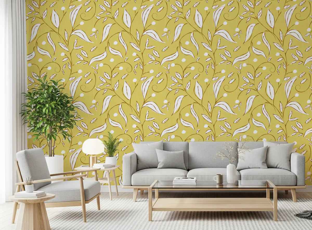 Sunny butter-yellow tones lift a living room with Butter Yellow Botanical Vine wallpaper.