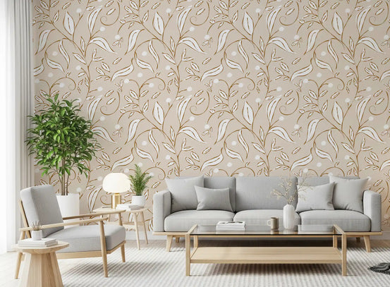 Caramel vines and pale dots fill a quiet living room, in beige botanical wallpaper.