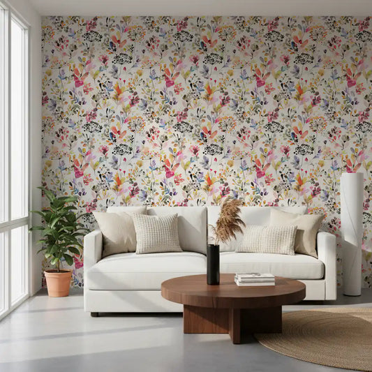 Painterly blooms cover a living room on this wildflower meadow wallpaper.