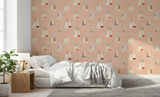Bedroom paired with the Mid Century Sailboats Wallpaper in a warm blush tone